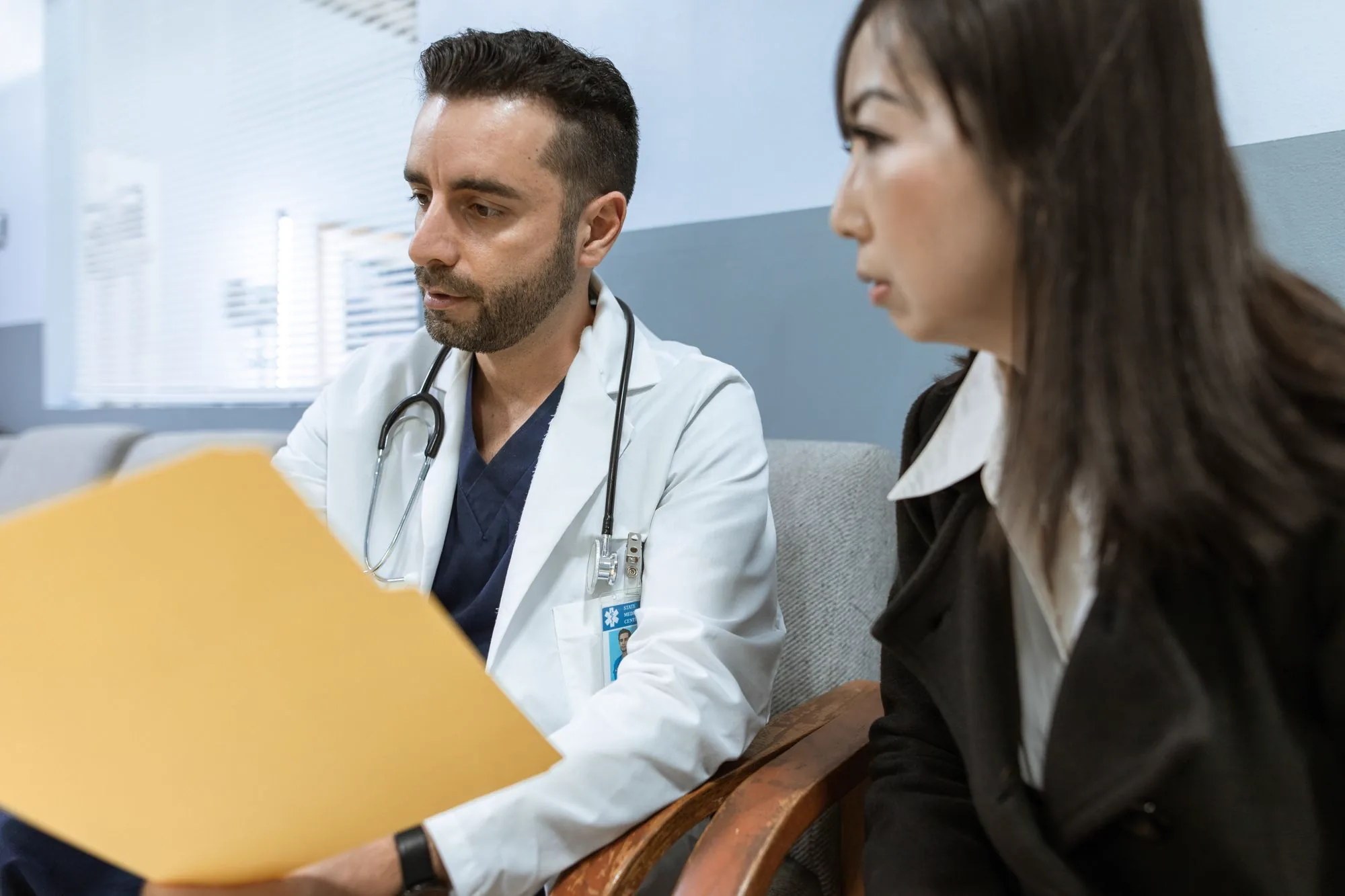 Provider reviewing health records with a patient